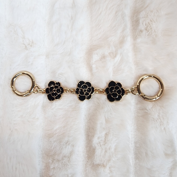 NWOT Black Camellia Bag Extender - Picture 1 of 2